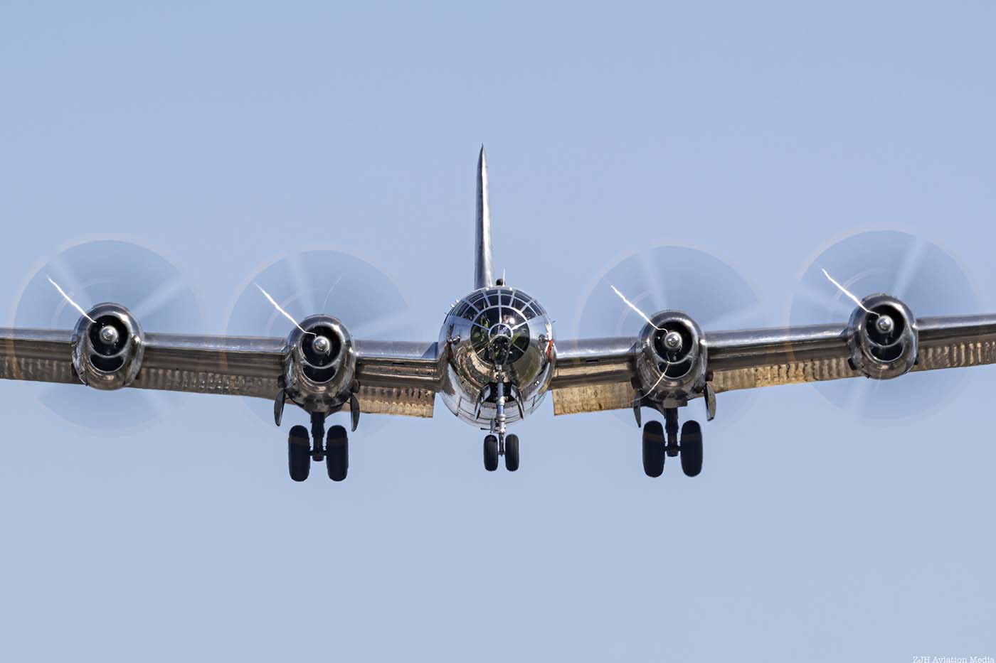 B-29 Superfortress head on in a blue sky