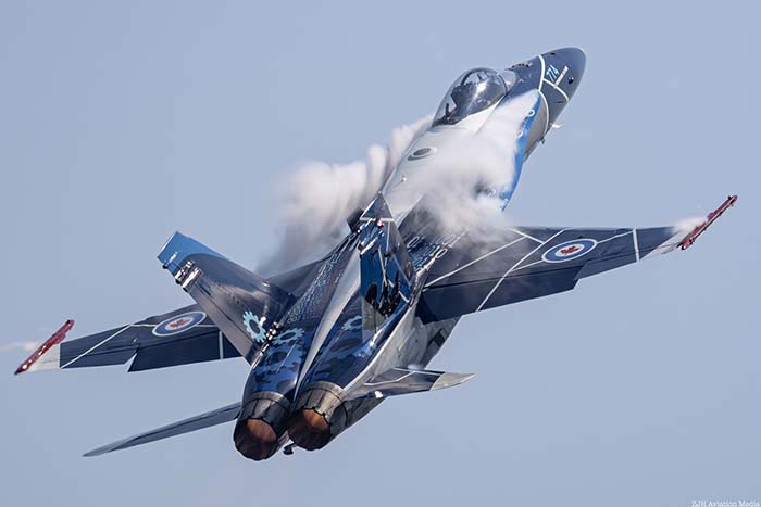 CF-188 Hornet back view in a blue sky