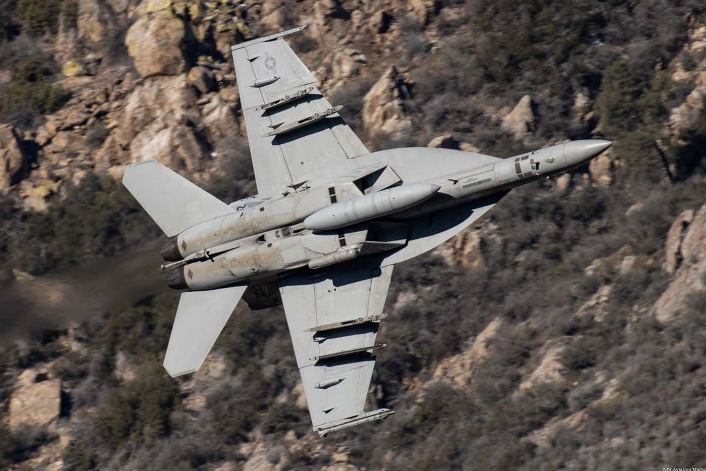 F/A-18 Super Hornet underside with a mountain background