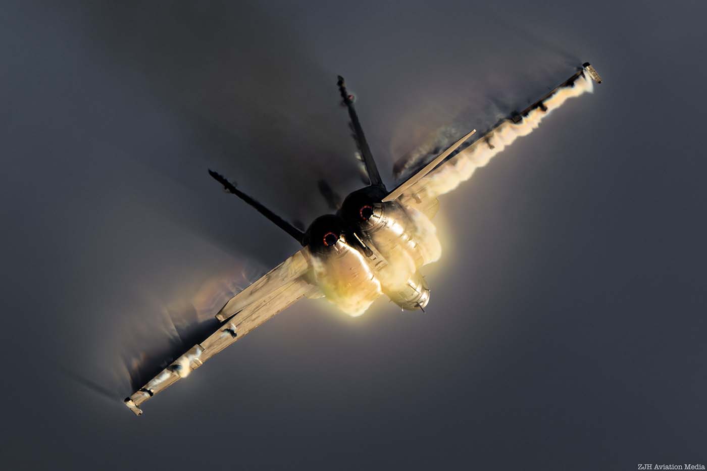 F/A-18 Super Hornet back view in a sunset blue sky